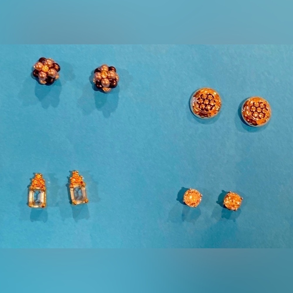 FOUR pairs of post earrings